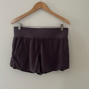 Fabletics Women’s High Waisted Athletic Shorts 
Purple